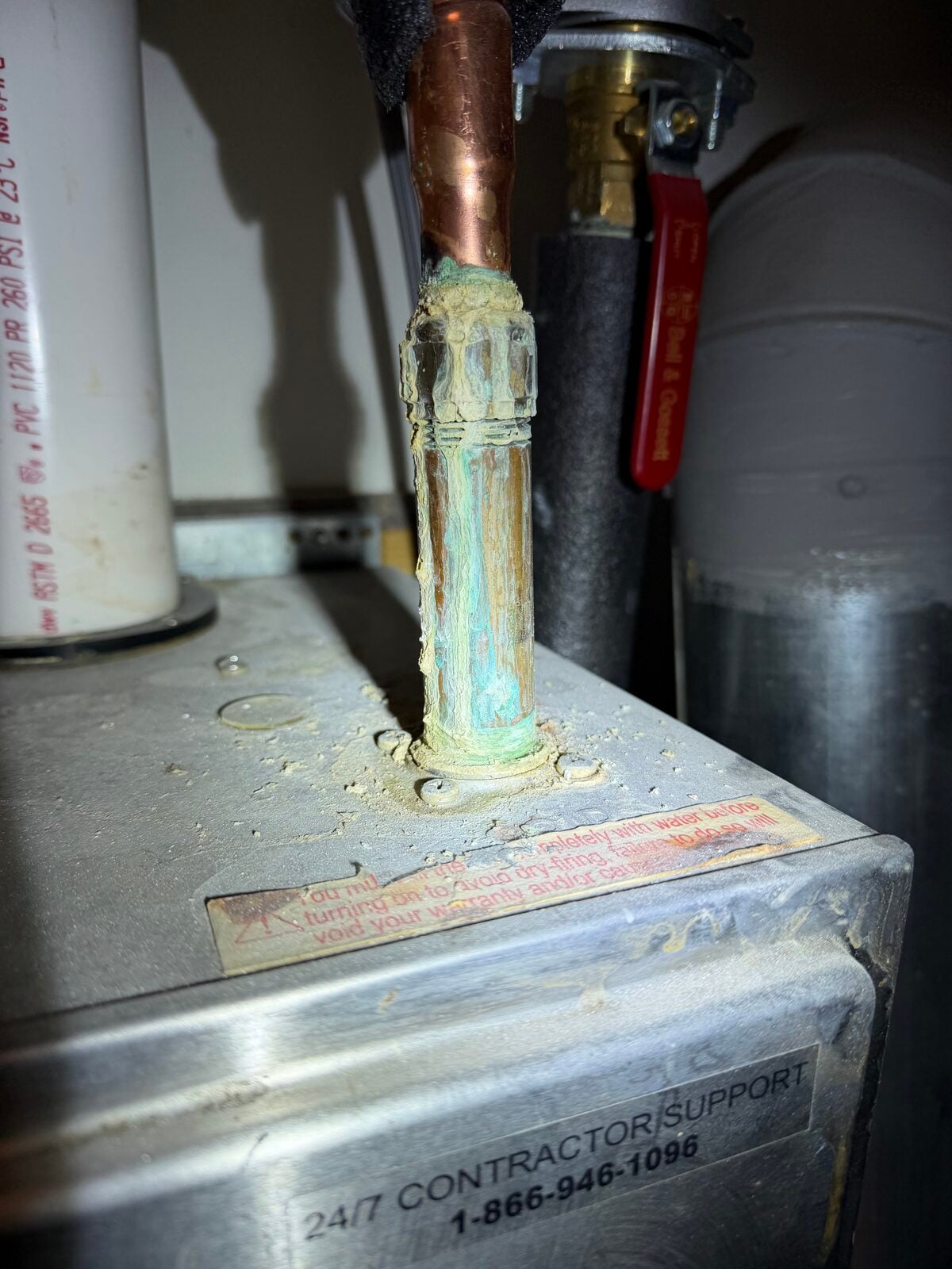 Galvanic corrosion at a dissimilar-metal plumbing connection found during a Dallas-Fort Worth home inspection
