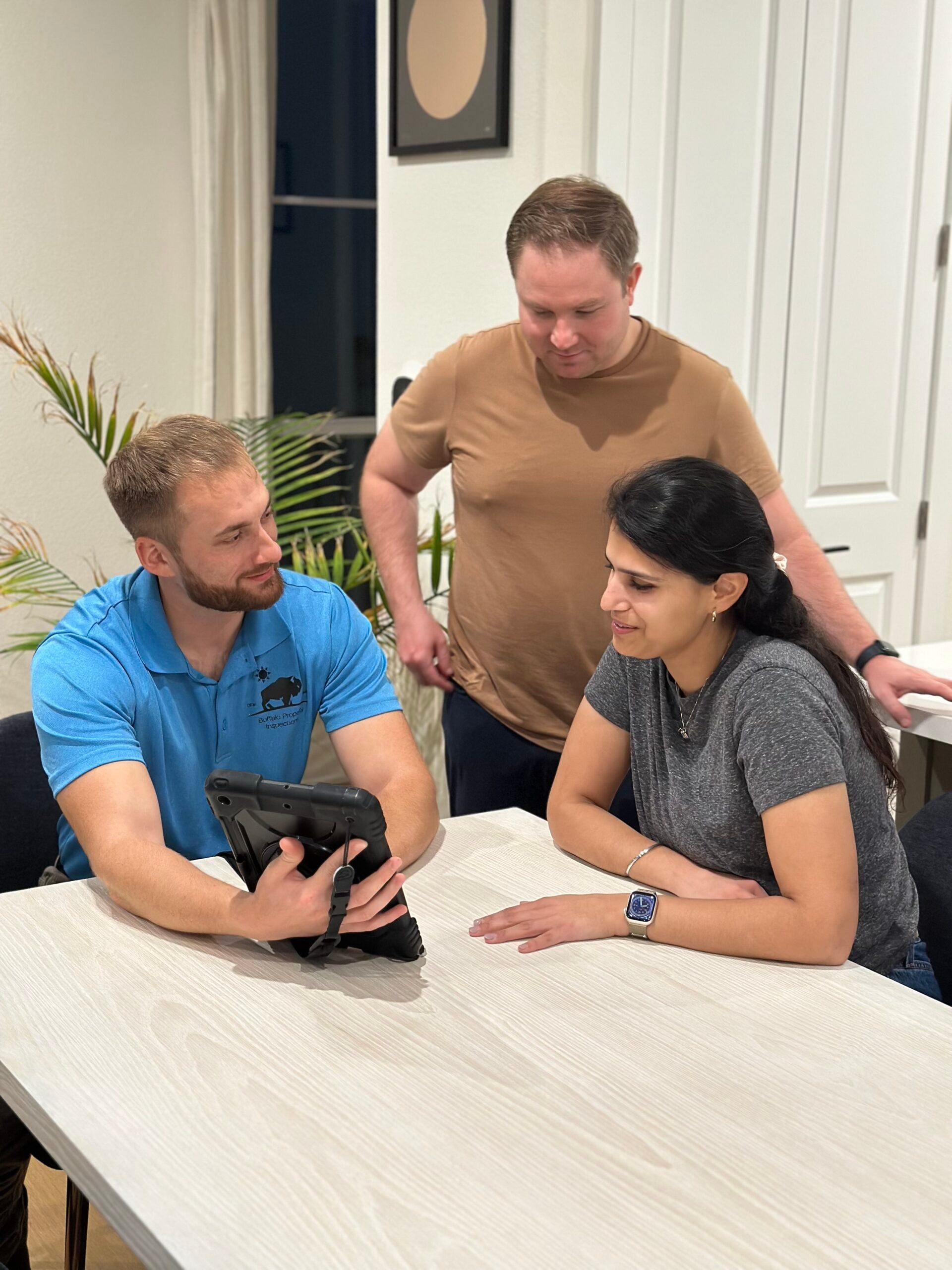 Buffalo Property Inspections inspector reviewing the home inspection report with buyers