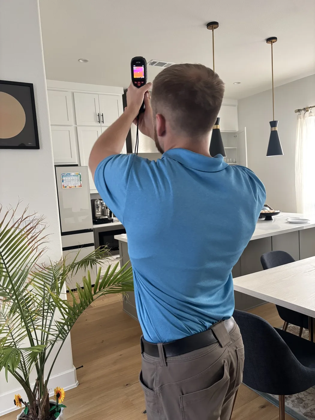 Buffalo Property Inspections inspector performing a thermal imaging scan during a Dallas-Fort Worth home inspection