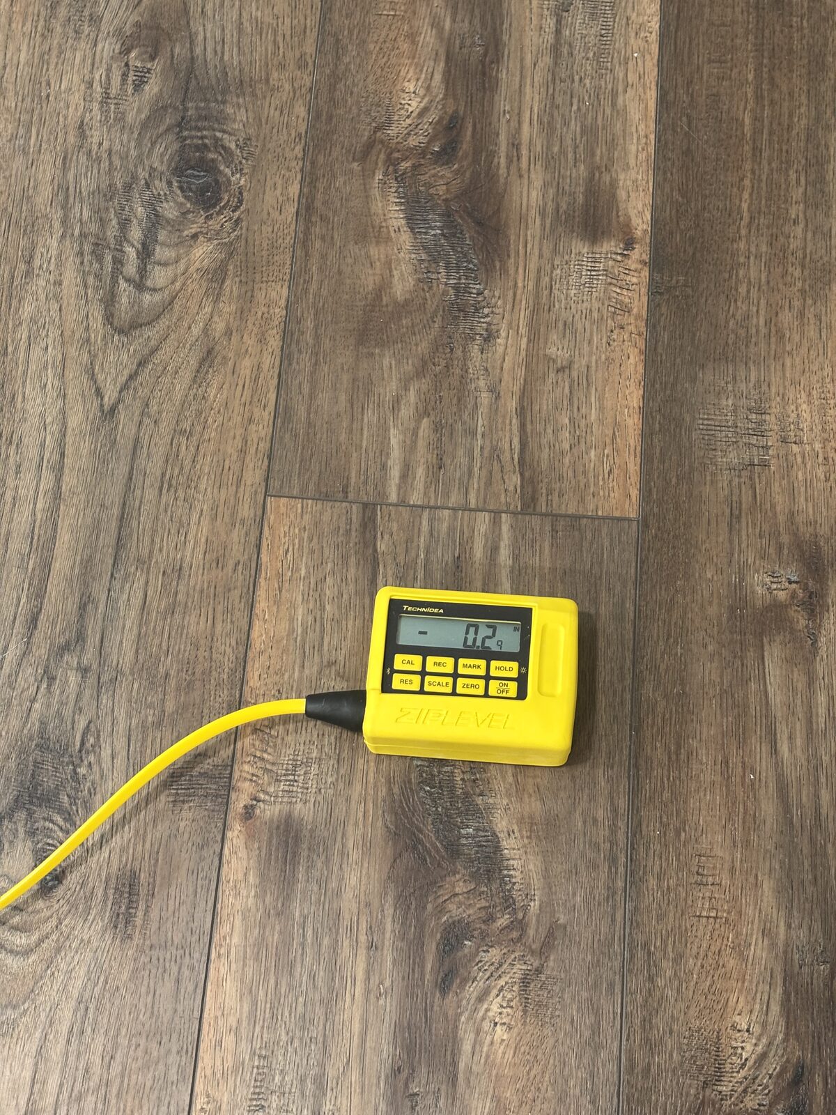 Zip level elevation reading during a Dallas-Fort Worth foundation inspection