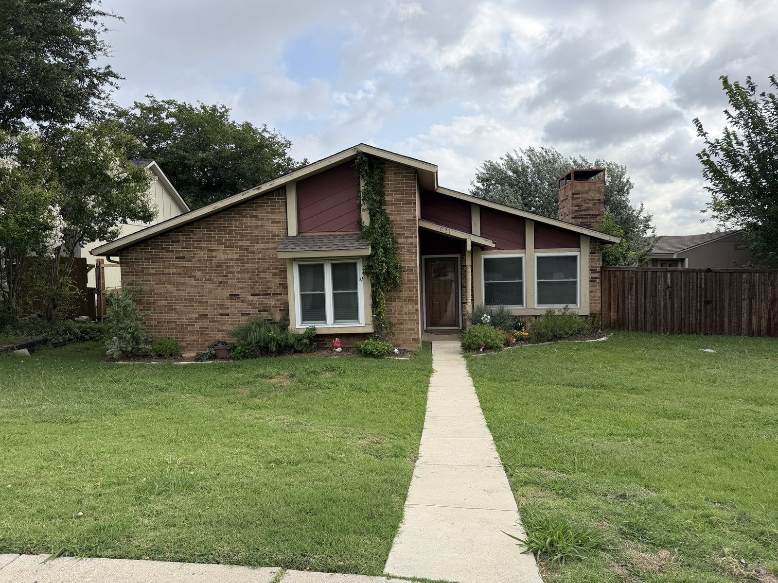 A 1980s brick ranch-style home in Garland, Texas during a home inspection by Buffalo Property Inspections