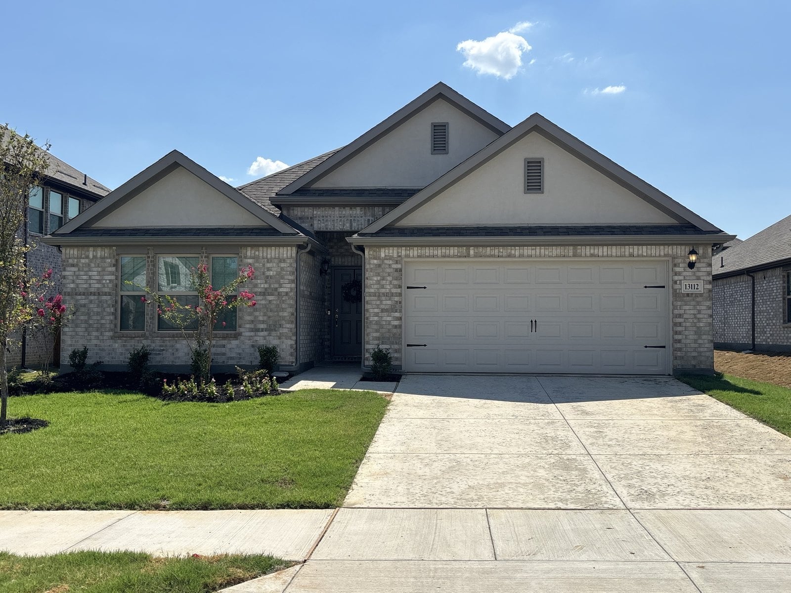 A newly built light brick and stucco home in Fort Worth, Texas during a home inspection by Buffalo Property Inspections
