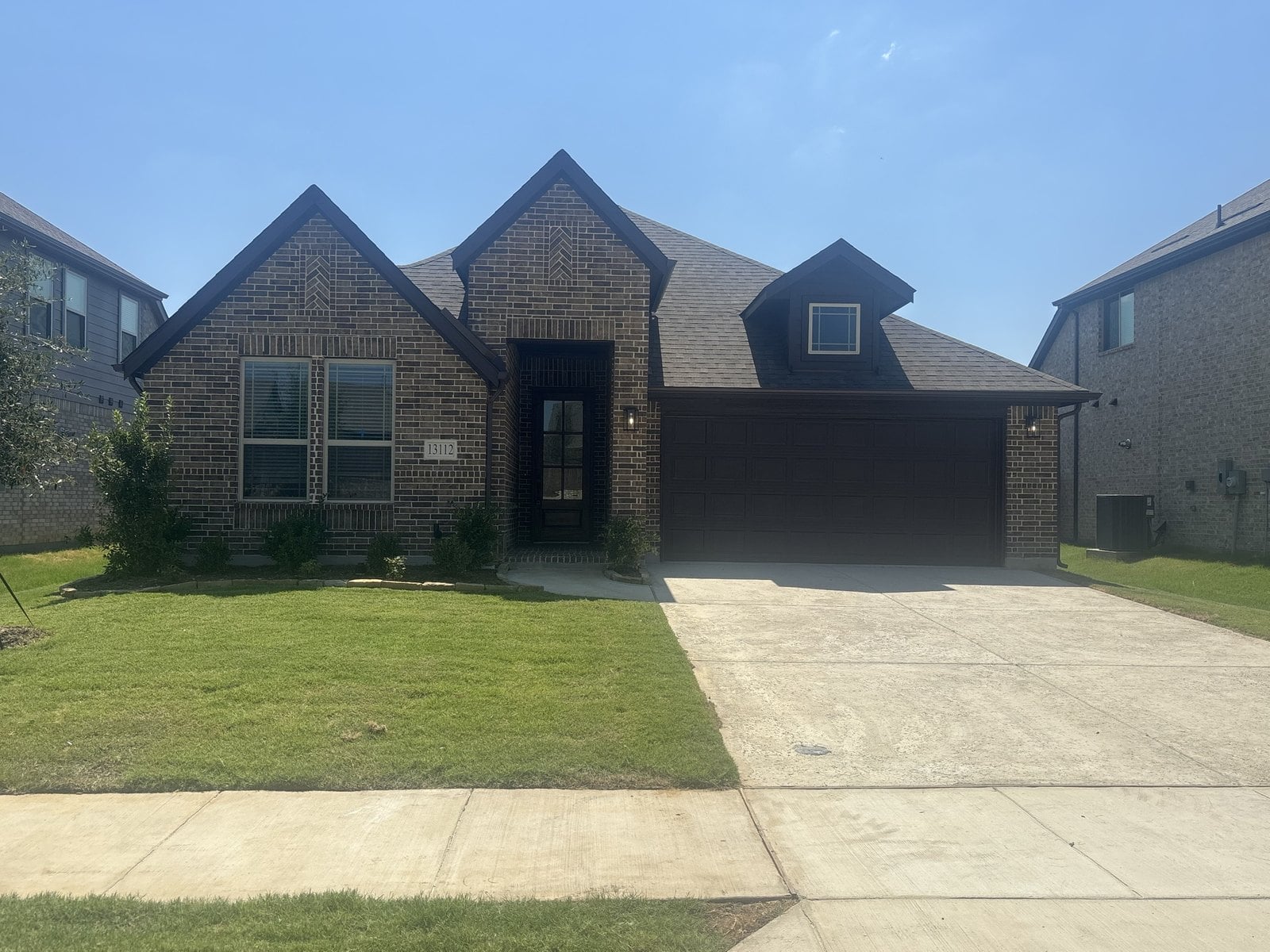 Home Inspection in Dallas 1 A newly built dark brick home in Dallas, Texas during a home inspection by Buffalo Property Inspections